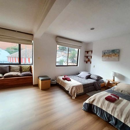 Hostal Mochiliers Bed And Breakfast Cuenca Exterior foto